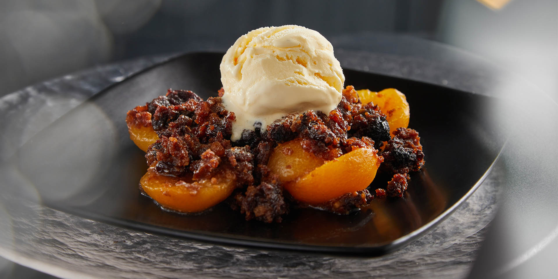 Baked fruit with Christmas pudding crumble - Dennis Edwards Foodservice